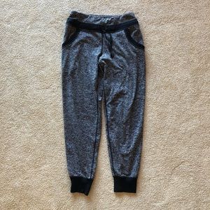 Marked black sweatpants